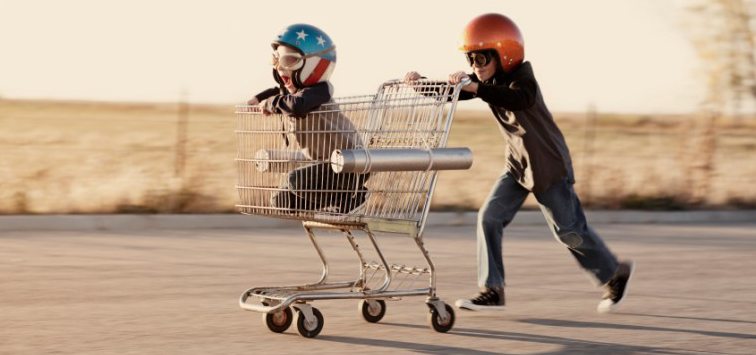 kids playing with shopping cart