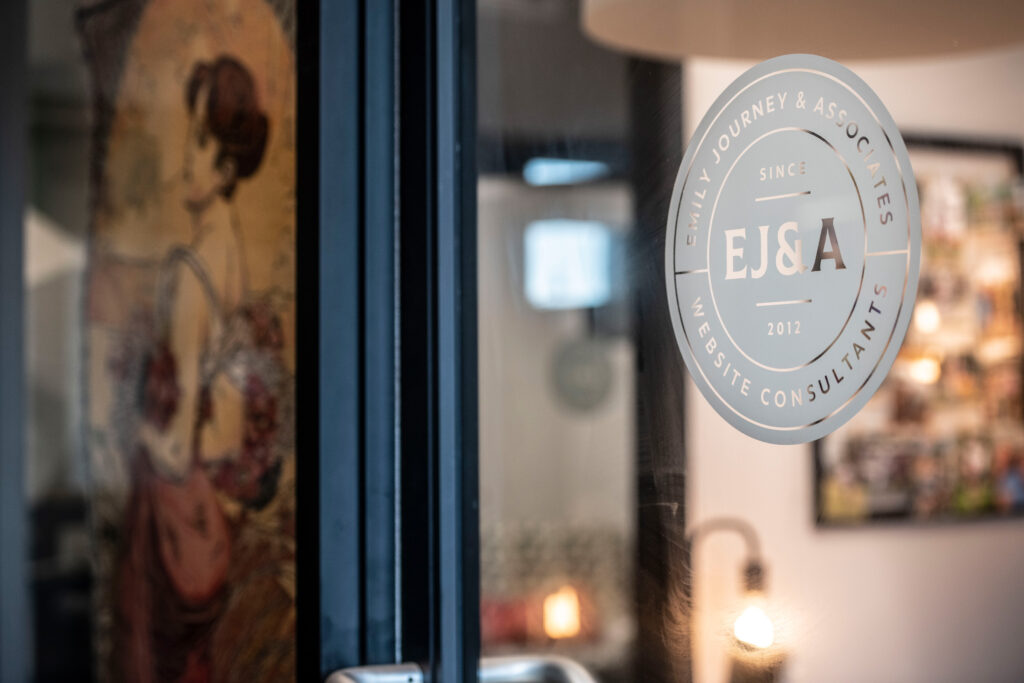 Glass door with EJA logo